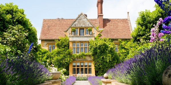 beautiful Le Manoir country house surrounded by lavender flowers